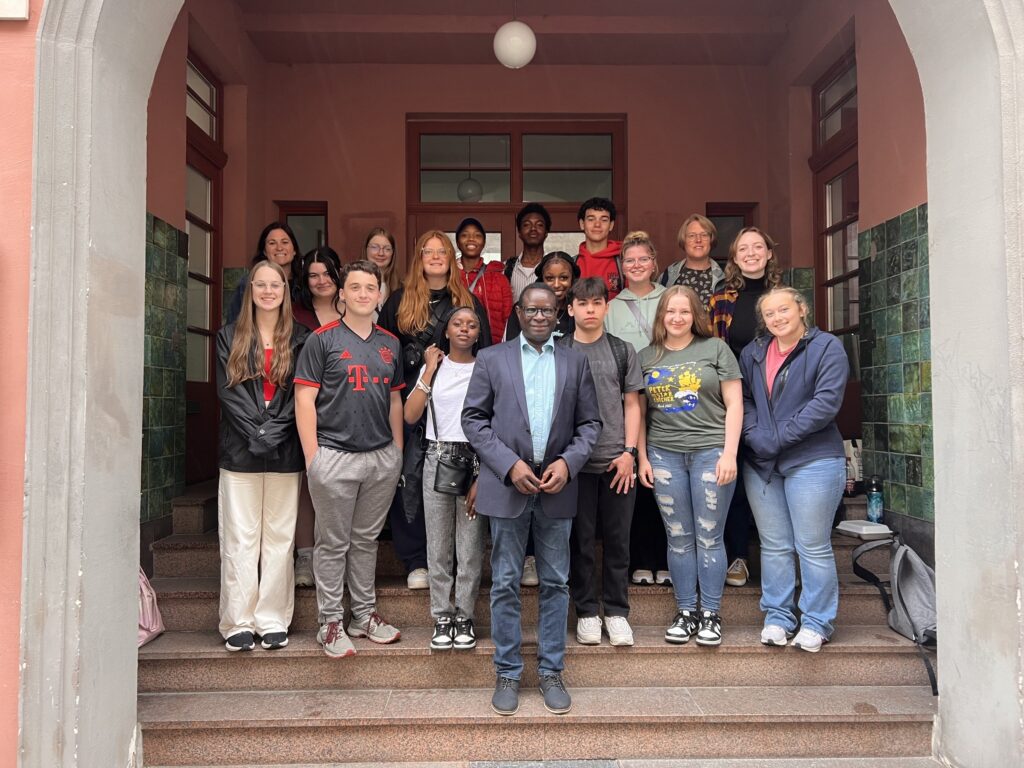 The students with Dr. Karamba Diaby, a member of the German Bundestag who represents Halle.