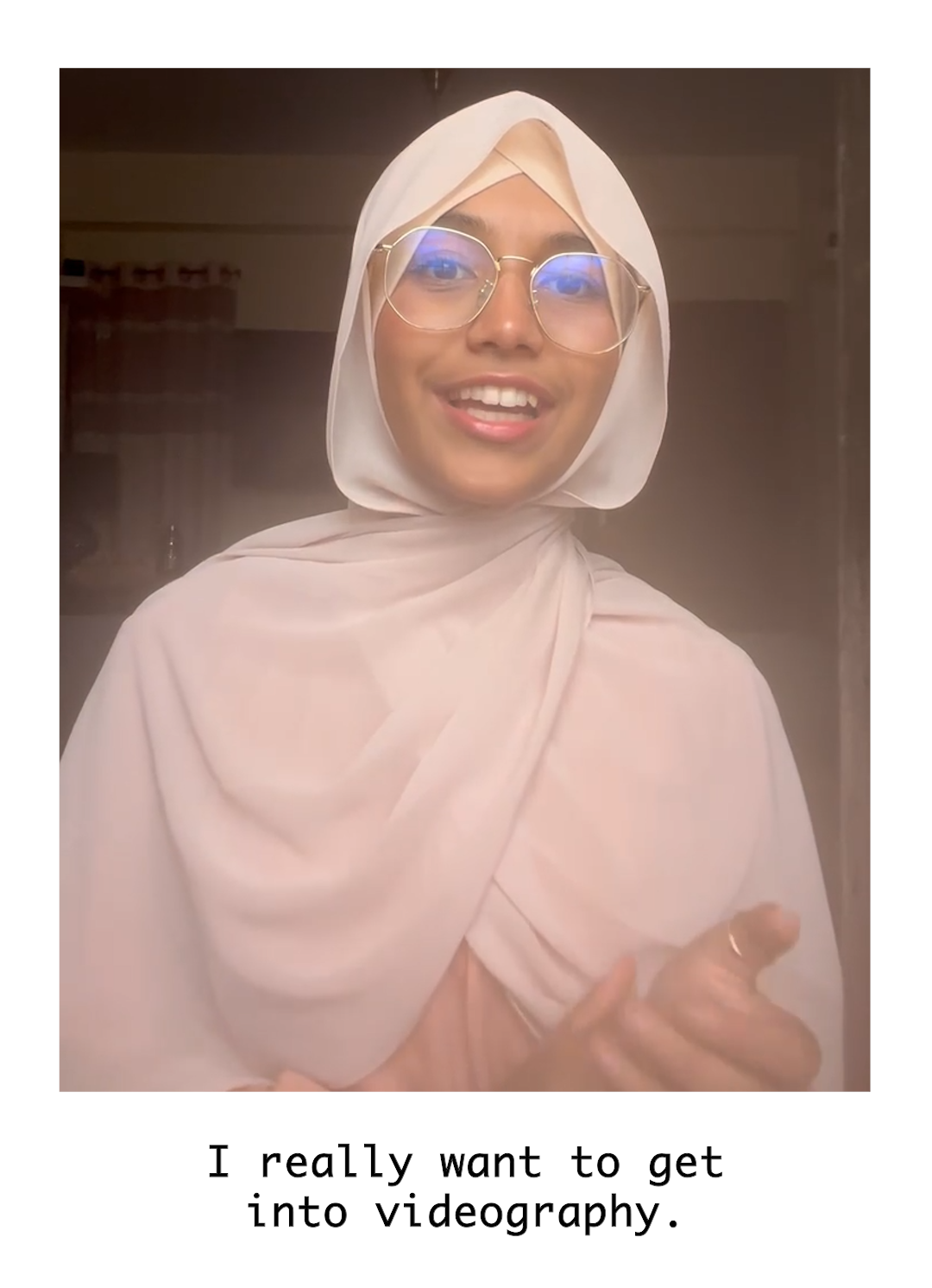 image of a girl wearing glasses and a pink headscarf who wants to get into videography